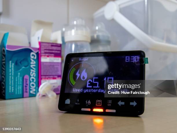 In this photo illustration, a power meter located in a family home shows the use of fuel for the previous day within that household on April 08, 2022...