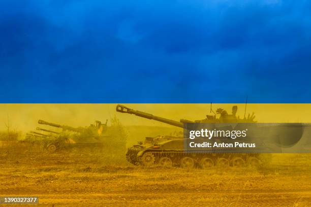 russian invasion of ukraine. ukrainian flag - artillery stock pictures, royalty-free photos & images