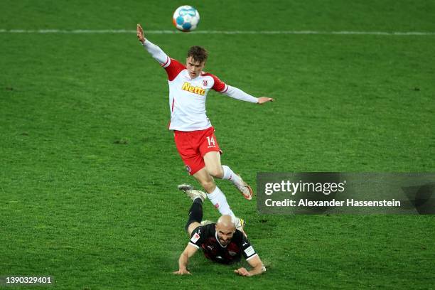 David Otto of Regensburg battles for the ball with Nico Antonitsch of Ingolstadt during the Second Bundesliga match between SSV Jahn Regensburg and...