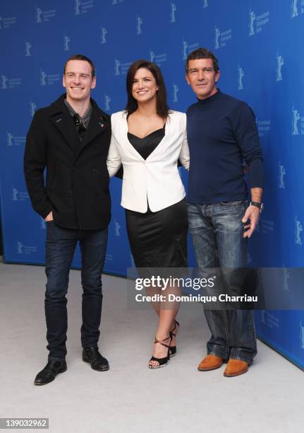 Actors Michael Fassbender, Gina Carano and Antonio Banderas attends the "Haywire" Photocall during day seven of the 62nd Berlin International Film...