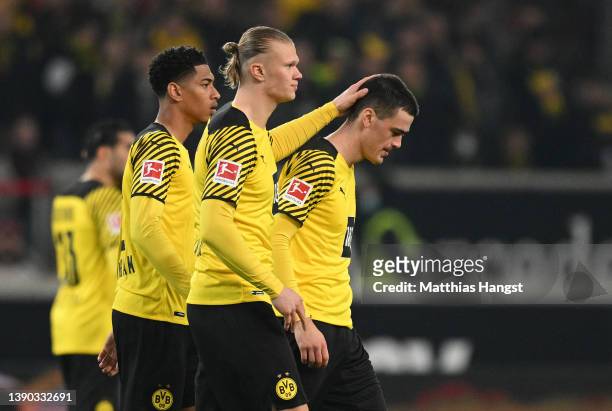 Erling Haaland consoles Giovanni Reyna of Dortmund who walks off the picth very soon after the start during the Bundesliga match between VfB...