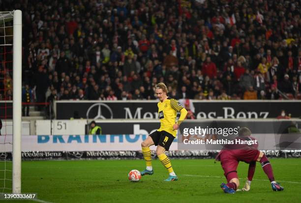 Julian Brandt of Dortmund scores his team's first goalduring the Bundesliga match between VfB Stuttgart and Borussia Dortmund at Mercedes-Benz Arena...