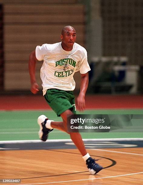 The Boston Celtics trying out Kobe Bryant as coaches look on during practice at Brandeis University.