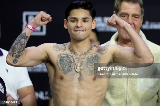 Ryan Garcia stands on the scale during his weigh in at the Alamodome on April 08, 2022 in San Antonio, Texas.