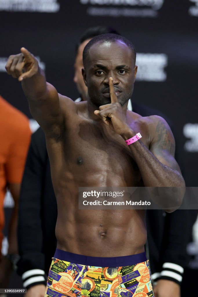 Tagoe Emmanuel Tagoe of Ghana stands on the scale during his weigh in at ...