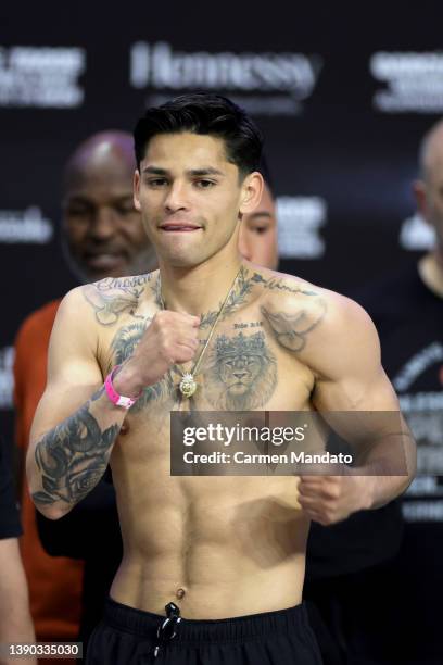 Ryan Garcia stands on the scale during his weigh in at the Alamodome on April 08, 2022 in San Antonio, Texas.