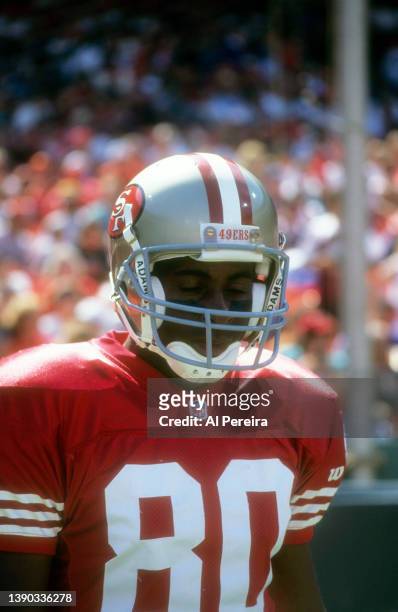 Wide Receiver Jerry Rice of the San Francisco 49ers walks off the field upset in the game between the Los Angeles Rams vs the San Francisco 49ers at...