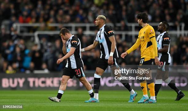 Ryan Fraser of Newcastle United reacts after picking up an injury before being substituted during the Premier League match between Newcastle United...