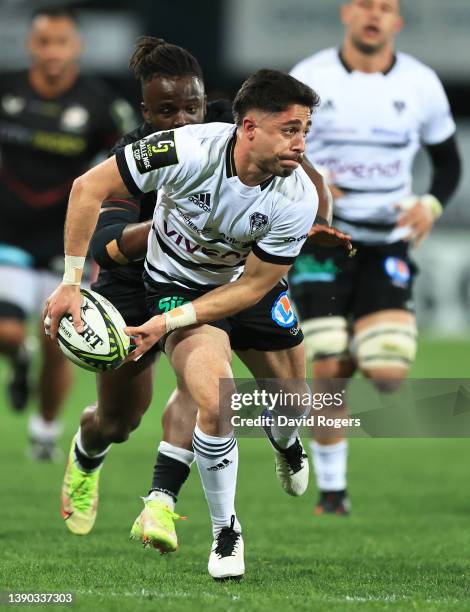 Tedo Abzhandadze of CA Brive is tackled by Rotimi Segun of Saracens during the Challenge Cup match between Brive and Saracens at Stade...