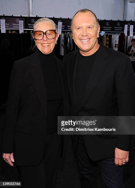 Joan Kors and designer Michael Kors pose backstage at the Michael Kors Fall 2012 fashion show during Mercedes-Benz Fashion Week at The Theatre at...