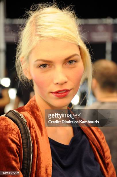 Model poses backstage at the Michael Kors Fall 2012 fashion show during Mercedes-Benz Fashion Week at The Theatre at Lincoln Center on February 15,...