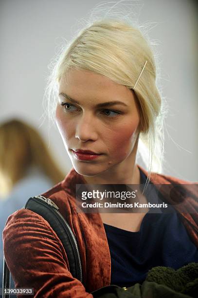 Model poses backstage at the Michael Kors Fall 2012 fashion show during Mercedes-Benz Fashion Week at The Theatre at Lincoln Center on February 15,...