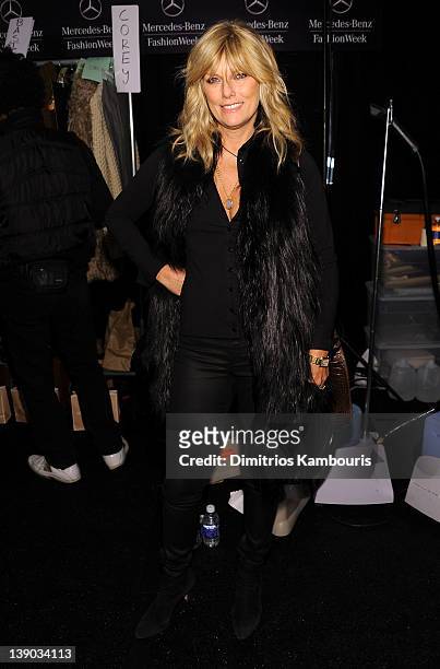 Patti Hansen poses backstage at the Michael Kors Fall 2012 fashion show during Mercedes-Benz Fashion Week at The Theatre at Lincoln Center on...