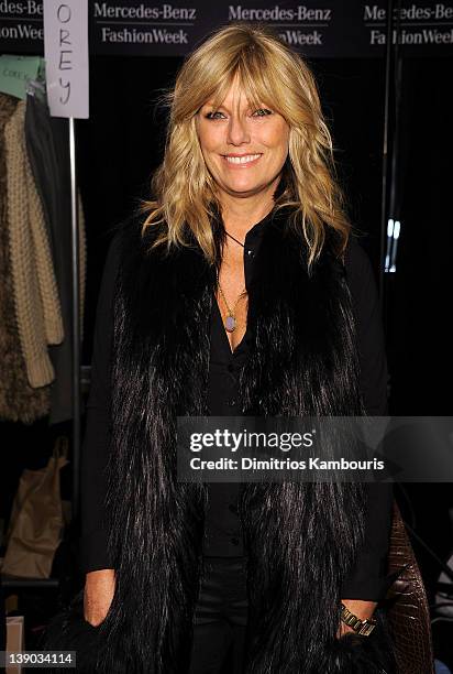 Patti Hansen poses backstage at the Michael Kors Fall 2012 fashion show during Mercedes-Benz Fashion Week at The Theatre at Lincoln Center on...