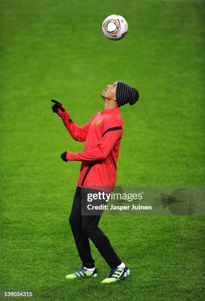 Nani of Manchester United juggles the ball during a training session on the eve of the Europa League match between Ajax and Manchester United at...