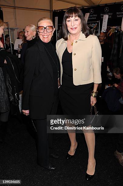 Joan Kors and actress Anjelica Huston pose backstage at the Michael Kors Fall 2012 fashion show during Mercedes-Benz Fashion Week at The Theatre at...