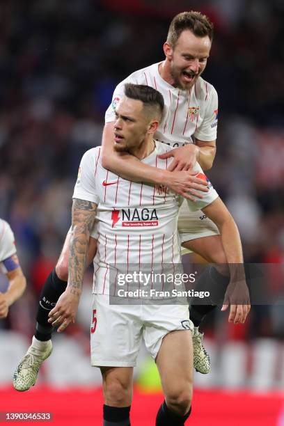 Lucas Ocampos of Sevilla FC celebrates with Ivan Rakitic after scoring his sides second goal during the La Liga Santander match between Sevilla FC...