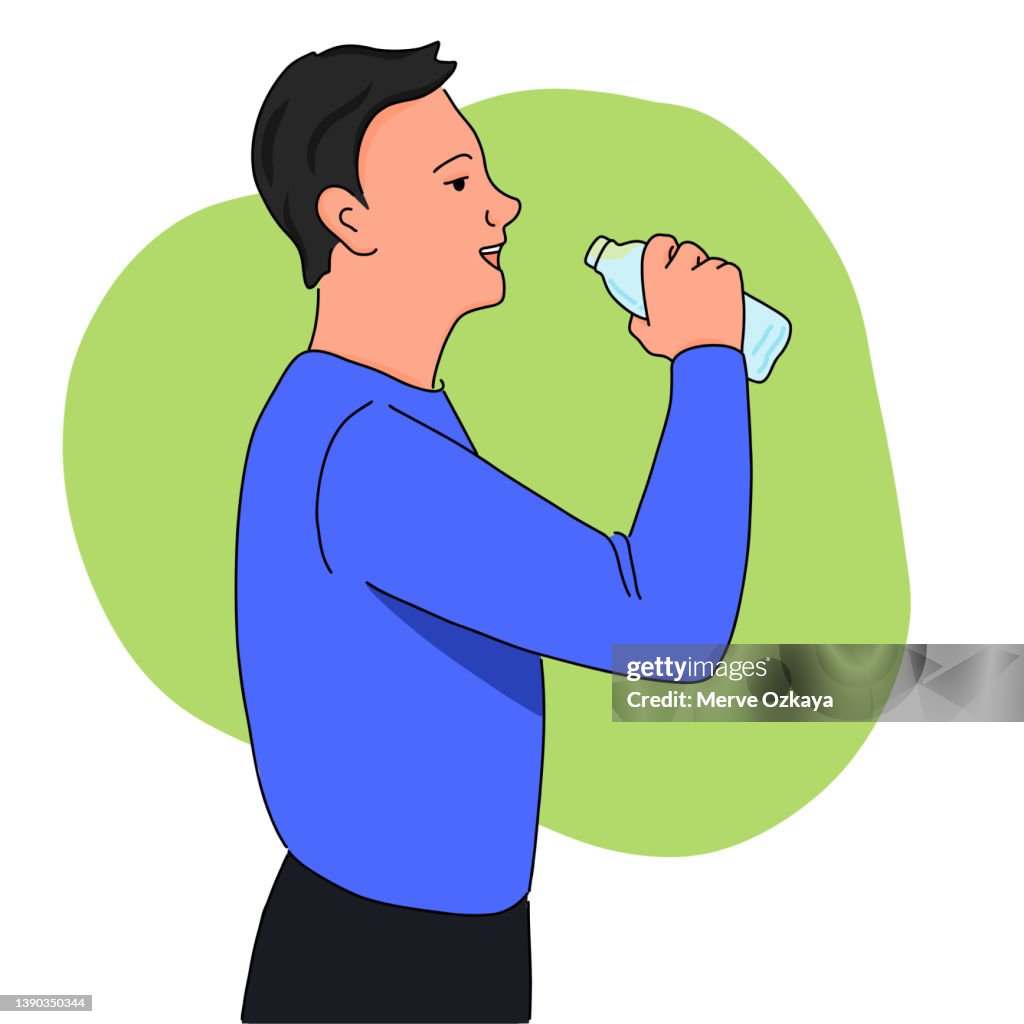 A young man drinks water