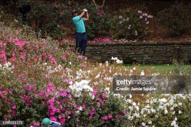 Tiger Woods plays his shot from the 13th tee during the second round of The Masters at Augusta National Golf Club on April 08, 2022 in Augusta,...