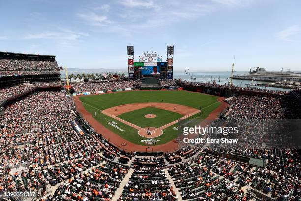Logan Webb of the San Francisco Giants pitches the first pitch of the season to Jorge Soler of the Miami Marlins during their opening day game at...