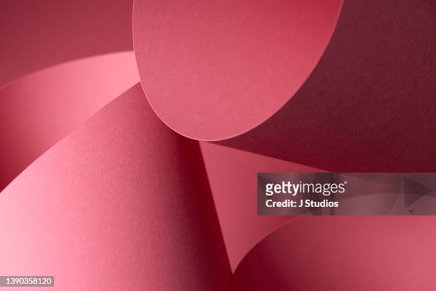 abstract pink paper background - abstrakter bildhintergrund stock-fotos und bilder