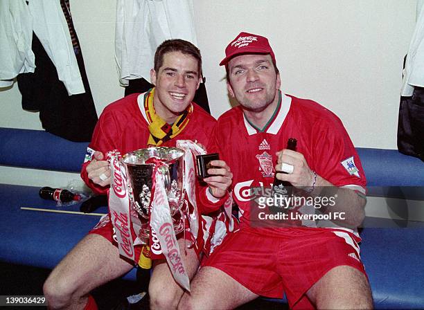 V Bolton Wanderers in the COca-cola cup final at Wembley won 2-1. Jamie Redknapp and Neil Ruddock celebrate in the dressing room with the cup. On...