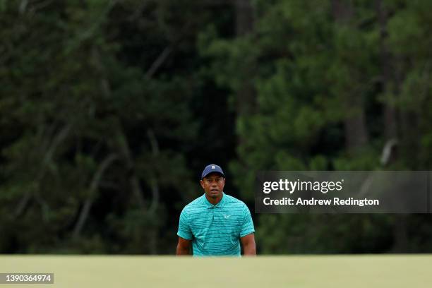 Tiger Woods walks to the 18th green during the second round of The Masters at Augusta National Golf Club on April 08, 2022 in Augusta, Georgia.