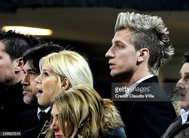 Maxi Lopez of AC Milan and his wife Wanda Naraduring the UEFA Champions League round of 16 first leg match between AC Milan and Arsenal FC at Stadio...