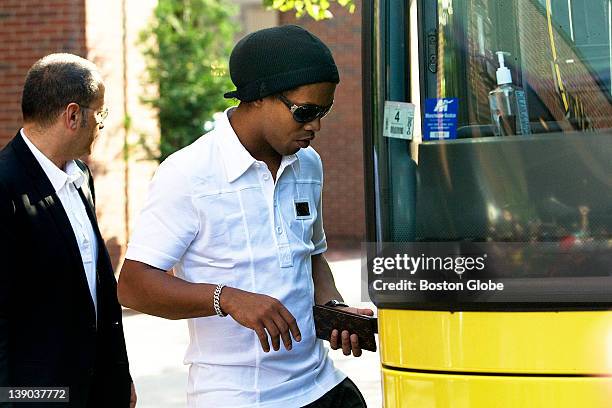 Milan star Ronaldo de Assis Moreira "Ronaldinho" leaves the Four Seasons hotel in Boston, after playing Inter Milan the day before at Gillette...