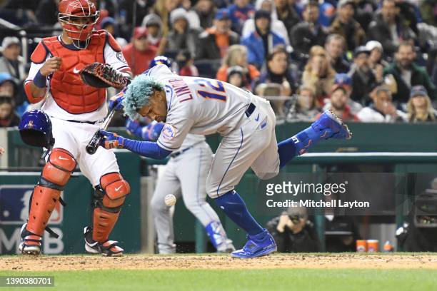 Francisco Lindor of the New York Mets is hit by a pitch thrown by Steve Cishek of the Washington Nationals in the fifth inning by during a baseball...