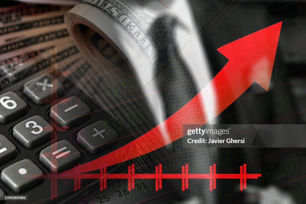 Economy graph: rising red arrow, dollars, calculator and businessman