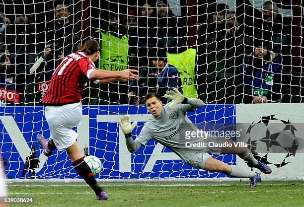 Zlatan Ibrahimovic of AC Milan scores the fourth goal during the UEFA Champions League round of 16 first leg match between AC Milan and Arsenal FC at...
