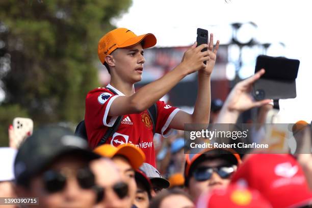 Fans wait for the drivers to arrive and sign autographs prior to final practice ahead of the F1 Grand Prix of Australia at Melbourne Grand Prix...