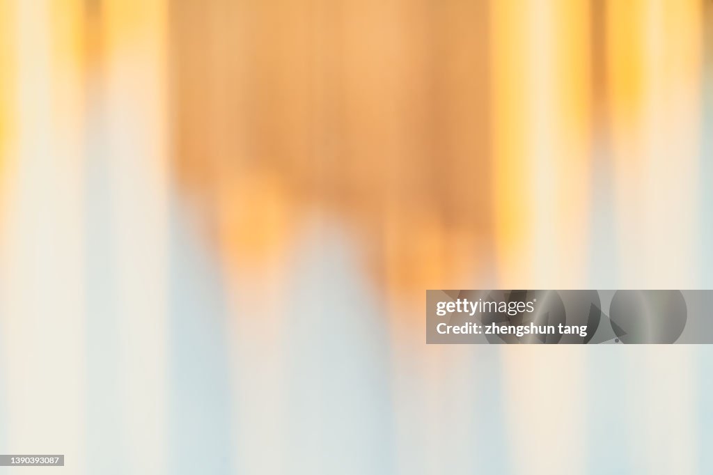 Golden stripe pattern on the wall.