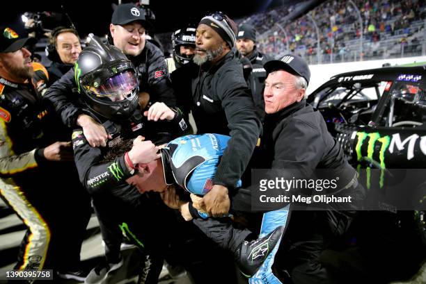 Sam Mayer, driver of the Accelerate Pros Talent Chevrolet, and Ty Gibbs, driver of the Monster Energy Toyota, get into an altercation after the...