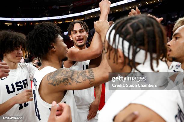 Dereck Lively II of USA Team celebrates with teammates after beating the World Team 102-80 during the Nike Hoop Summit at Moda Center on April 08,...