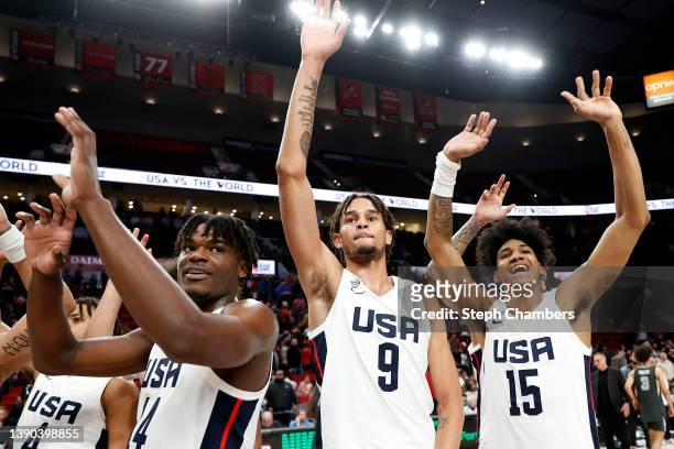 Jarace Walker, Dereck Lively II and Dillon Mitchell of USA Team celebrate after beating the World Team 102-80 during the Nike Hoop Summit at Moda...