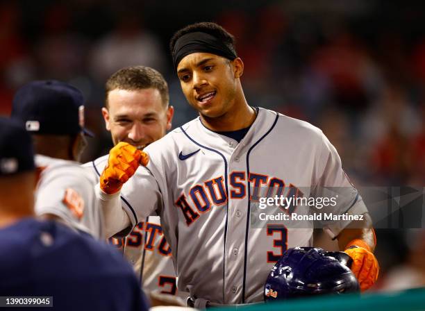 Jeremy Pena of the Houston Astros celebrates his first MLB home run against the Los Angeles Angels in the seventh inning at Angel Stadium of Anaheim...