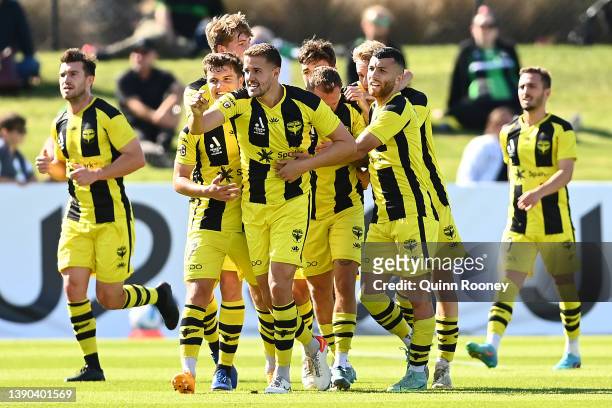Scott Wootton of the Phoenix is congratulated by team mates after scoring a goal during the A-League Mens match between Western United and Wellington...