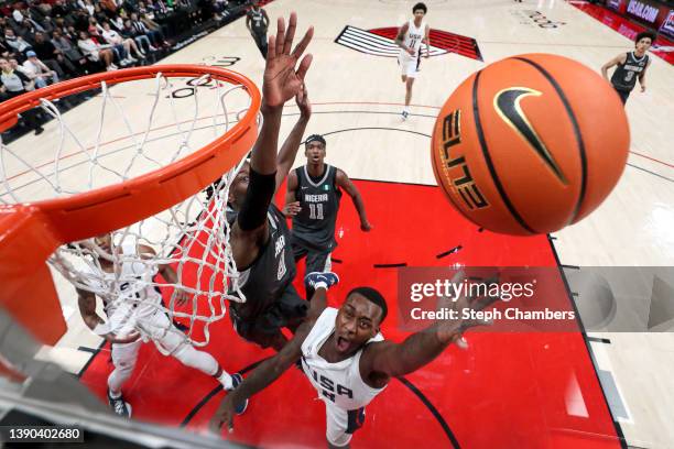 Dariq Whitehead of USA Team shoots against Leonard Miller of World Team during the second half in the Nike Hoop Summit at Moda Center on April 08,...