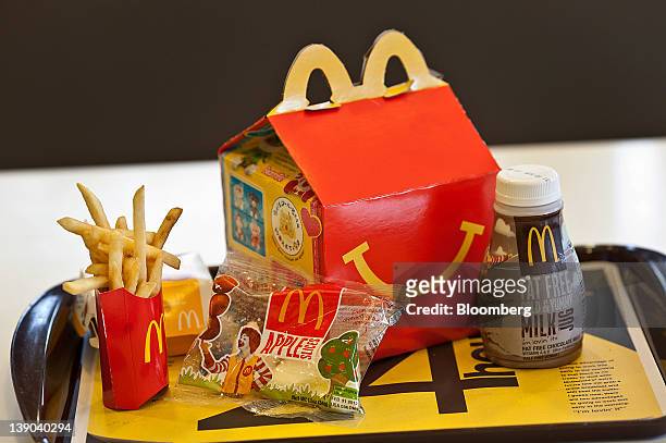 Happy Meal is displayed for a photograph on a tray at a McDonald's Corp. Restaurant in Little Falls, New Jersey, U.S., on Wednesday, Feb. 15, 2012....