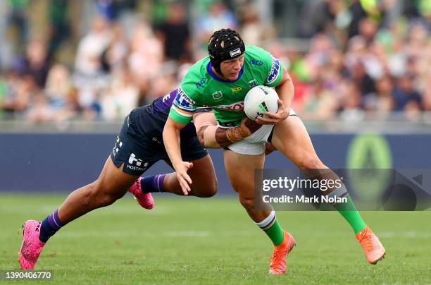 Brad Schneider of the Raiders is tackled during the round five NRL match between the Canberra Raiders and the Melbourne Storm at McDonalds Park, on...