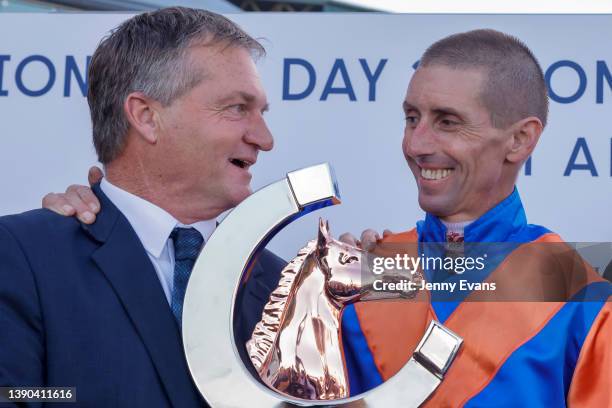 Nash Rawiller and trainer Kerry Parker pose with the trophy after winning race 8 the Longines Queen Elizabeth Stakes with Think It over during The...