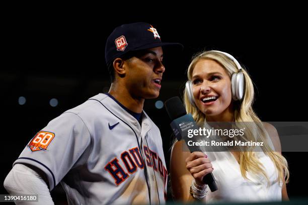 Reporter Heidi Watney of Apple TV+ interviews Jeremy Pena of the Houston Astros at Angel Stadium of Anaheim on April 08, 2022 in Anaheim, California.