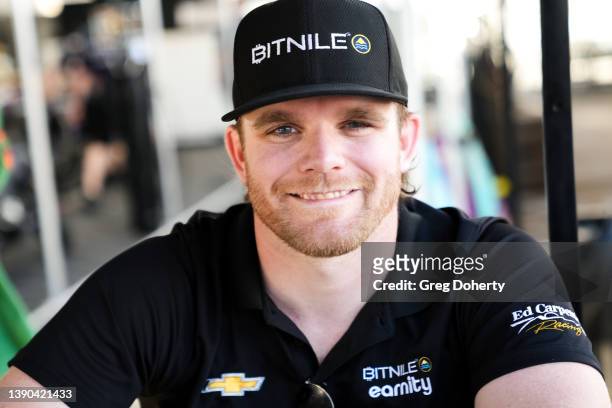 IndyCar Series driver Conor Daly signs autographs at the 2022 Acura Grand Prix Of Long Beach on April 08, 2022 in Long Beach, California.