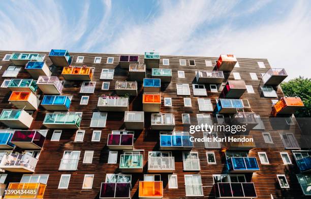 a colourful apartment building in the netherlands - noord holland landschap stockfoto's en -beelden