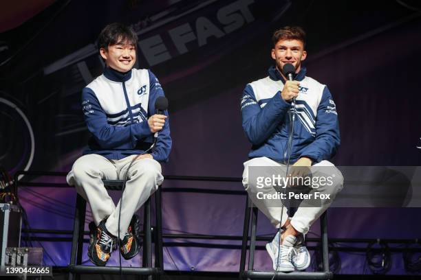 Yuki Tsunoda of Scuderia AlphaTauri and Japan with Pierre Gasly of Scuderia AlphaTauri and France at the fans forum during qualifying ahead of the F1...