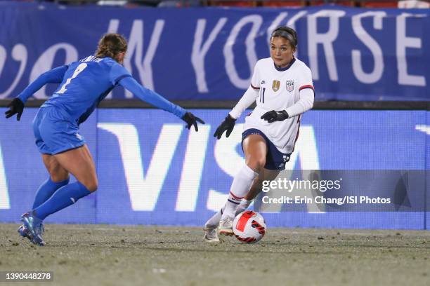 Sophia Smith of the United States turns and moves with the ball along the sideline during a game between Iceland and USWNT at Toyota Stadium on...