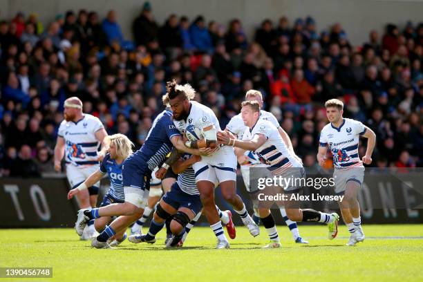 Nathan Hughes of Bristol Bears is challenged by Dan du Preez of Sale Sharks during the Heineken Champions Cup Round of 16 Leg One match between Sale...