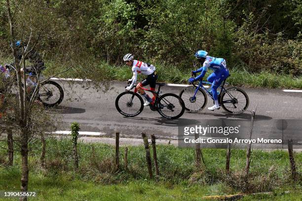 Kenny Elissonde of France and Team Trek - Segafredo and Tsgabu Gebremaryam Grmay of Ethiopia and Team BikeExchange - Jayco compete during the 61st...